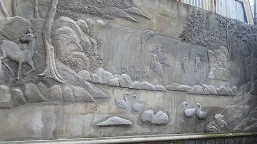 tranh phù điêu đắp nổi bằng xi măng giả đồng